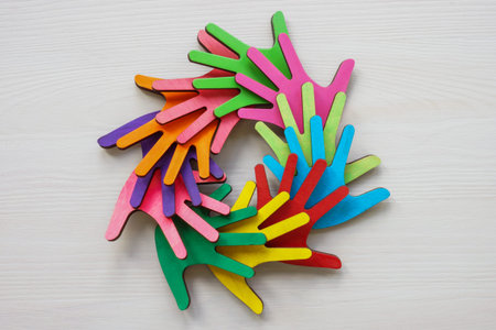 Circle of colorful palms as abstract symbol of Diversity, equity, and inclusion DEI.