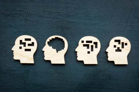 Lateral or logical thinking. Figures of heads with a brain.