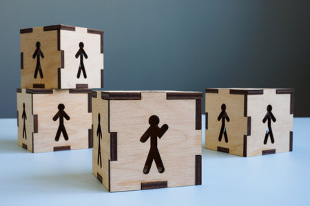 Cubes with outlines of people and one activist. Be different, be distinctive.の写真素材