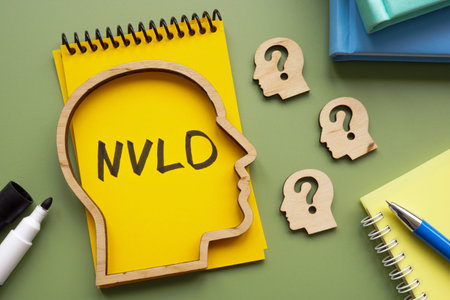 Notebook with abbreviation NVLD Nonverbal Learning Disability and head models.