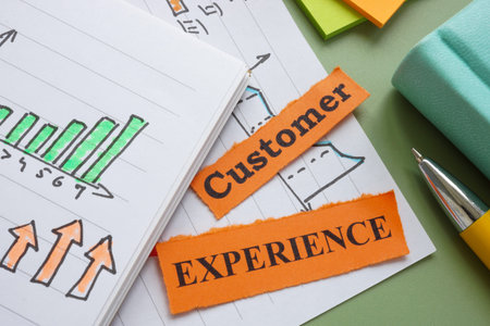 Customer experience abstract. Notebooks with graphs and pieces of paper.