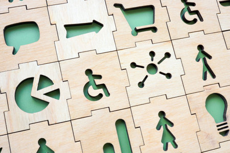 Puzzle with a sign of a disabled person as a concept of inclusive marketing.の写真素材