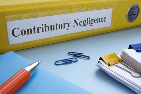 Yellow folder with label contributory negligence.