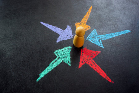 Arrows pointing at a figure. Customer centricity and focus.の写真素材