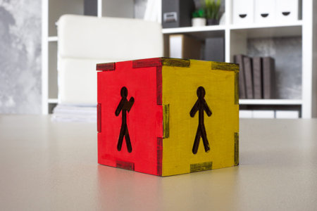 Office desk with a candidate selection cube. Hiring decisions and recruitment process.