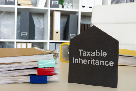 Taxable inheritance sign and documents. Symbolizes estate taxation.の写真素材