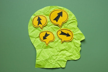 A paper head with arrows pointing in different directions. Indecision and the complexity of choices.