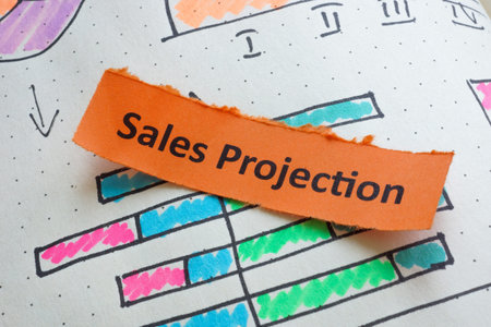 Graphs with the words sales projection. Future revenue expectations and market analysis.