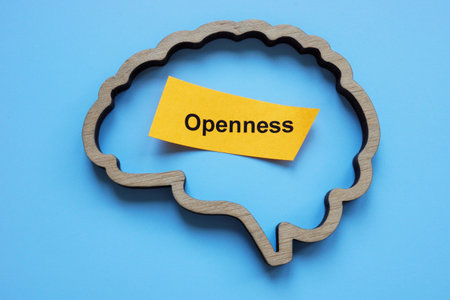 Openness text with brain symbolizing mental growth and open-mindedness.の写真素材