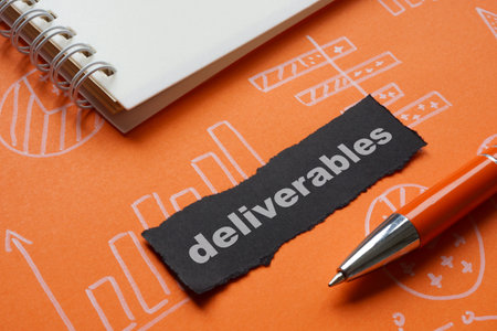 The word deliverables marked on financial graphs.の写真素材