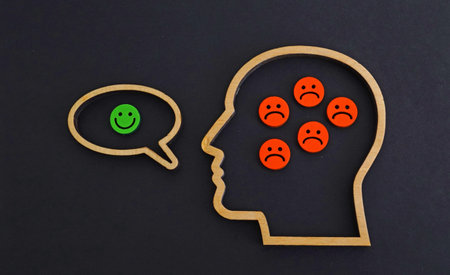 A head with negative emotions speaking positively. Inner conflict.の写真素材