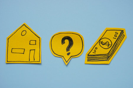 A house, a question mark, and dollars. Real estate investment.の写真素材