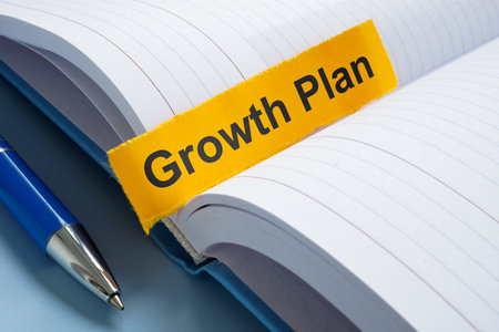 Growth plan tab in a notebook. Strategic planning and future development.の写真素材