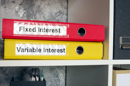 Folders labeled fixed and variable interest. Loan management.
