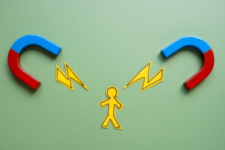 Marketing attraction and audience influence. Two magnets and figure.