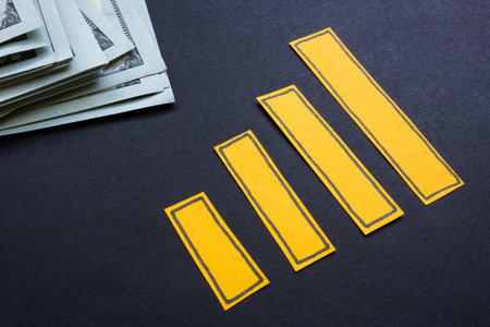 Growing chart with cash nearby. Personal savings.の写真素材