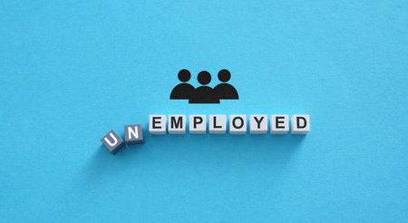 Word unemployed changing to employed. Job opportunity.の写真素材