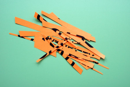 Cut paper with words as concept of broken communication.の写真素材