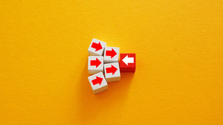 One block moving against the flow symbolizing leadership and innovative thinking.の写真素材