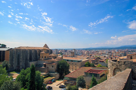 View of beautiful old town of Girona on the summer sunny day. Catalonia, Spain.の写真素材