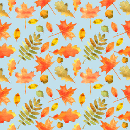Autumn leaves seamless pattern. Hand drawn watercolor painting. Colorful leaves isolated on blue. Fall theme. Perfect for wedding invitation, greeting card, fabric, banner, flyer, gift wrap, etc.の写真素材