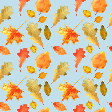 Autumn leaves seamless pattern. Hand drawn watercolor painting. Colorful leaves isolated on blue. Fall theme. Perfect for wedding invitation, greeting card, fabric, banner, flyer, gift wrap, etc.の写真素材