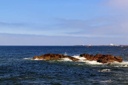Rocks in the Atlantic ocean, Porto, Portugal. Beautiful coast on a Sunny day. Nature photography.の写真素材