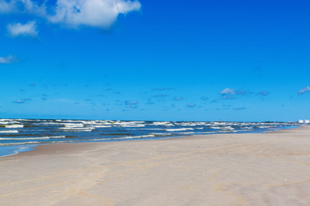 Curonian spit on a sunny summer day. Scenic view gray sand beach on the Baltic Sea coast in the village of Nida, Lithuaniaの写真素材