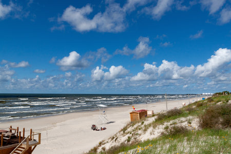 Curonian spit on a sunny summer day. Scenic view gray sand beach on the Baltic Sea coast in the village of Nida, Lithuaniaの写真素材