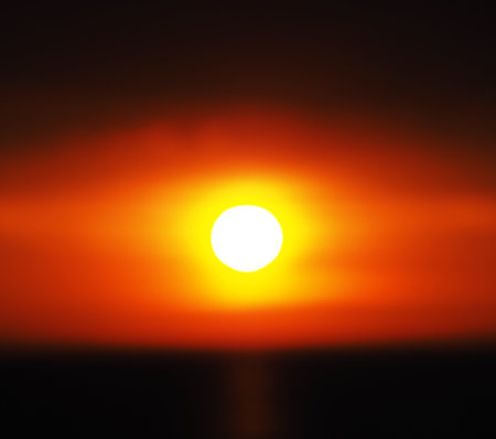 Underexposed sunset photography. Defocus light abstract background. Overlay light effectの写真素材