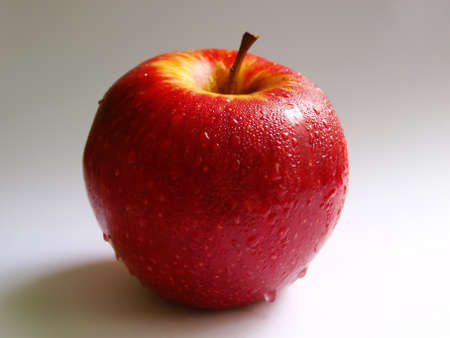 Red apple with water drops.の写真素材