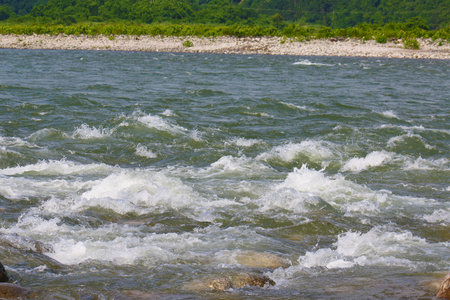 Wide Mountain River Cuts a Valley
