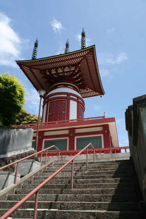 Looking up the steps to the pagoda from Yakuoji, Temple number 23 on the 88 Temple Pilgrimage in Shikoku, Japan.の写真素材