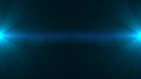 Lens flare light effect on dark background.の写真素材