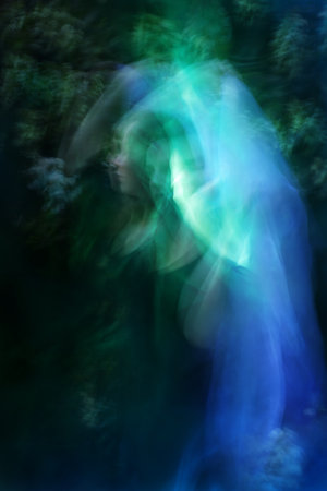 A dancer is turning with differently lit steps towards Hortensia flowers, with a waking up moment in the middle.の写真素材