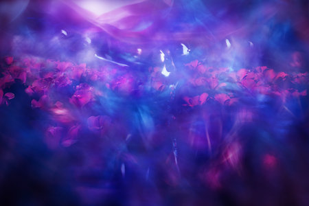 Projected scene with multiple light shapes of a woman, standing between purple tulip blossoms with wide open arms.の写真素材