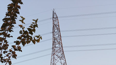 high voltage post. High-voltage tower sky background. Electricity distribution station.の写真素材