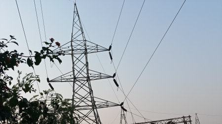 High voltage post. High-voltage tower sky background. Electricity distribution station.