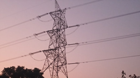 High voltage post. High-voltage tower sky sunset background.の写真素材
