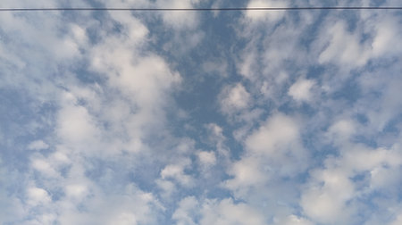 Blue sky with white clouds. Cloudscape. Panoramic image.
