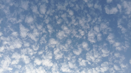 Blue sky background with white clouds. Cumulus white clouds in the blue sky. 3D illustration