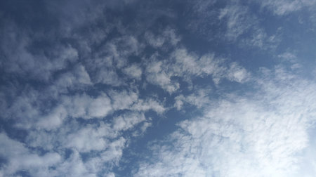 Blue sky background with white clouds. Sky with white clouds. White clouds on blue sky.