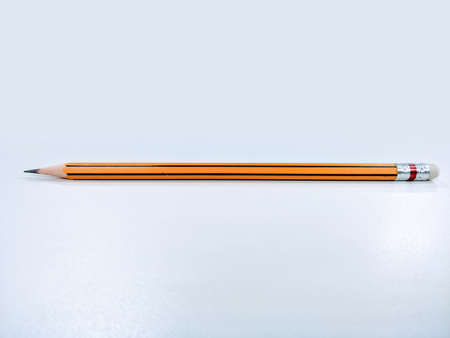 Various orange pencils isolated on the white.の写真素材