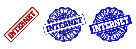 INTERNET grunge stamp seals in red and blue colors. Vector INTERNET labels with grunge effect. Graphic elements are rounded rectangles, rosettes, circles and text captions.のイラスト素材