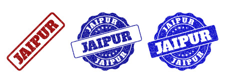 JAIPUR scratched stamp seals in red and blue colors. Vector JAIPUR signs with draft effect. Graphic elements are rounded rectangles, rosettes, circles and text captions.のイラスト素材