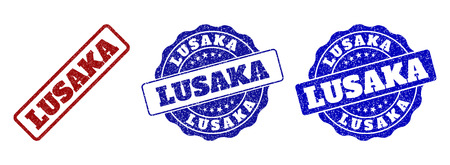 LUSAKA grunge stamp seals in red and blue colors. Vector LUSAKA labels with draft texture. Graphic elements are rounded rectangles, rosettes, circles and text labels.のイラスト素材