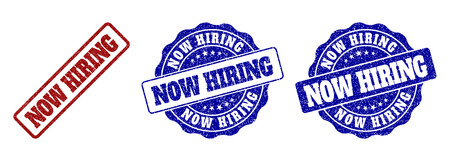 NOW HIRING grunge stamp seals in red and blue colors. Vector NOW HIRING labels with grainy effect. Graphic elements are rounded rectangles, rosettes, circles and text labels.のイラスト素材