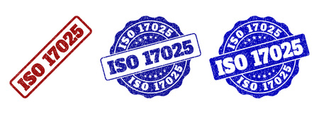 ISO 17025 grunge stamp seals in red and blue colors. Vector ISO 17025 marks with grunge surface. Graphic elements are rounded rectangles, rosettes, circles and text titles.のイラスト素材