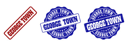 GEORGE TOWN scratched stamp seals in red and blue colors. Vector GEORGE TOWN labels with grunge effect. Graphic elements are rounded rectangles, rosettes, circles and text labels.のイラスト素材