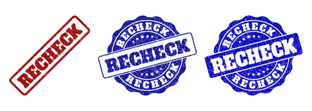 RECHECK scratched stamp seals in red and blue colors. Vector RECHECK labels with draft texture. Graphic elements are rounded rectangles, rosettes, circles and text labels.のイラスト素材